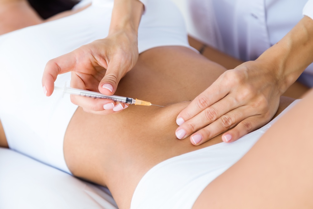 A woman receiving a Lipo-Mino injection