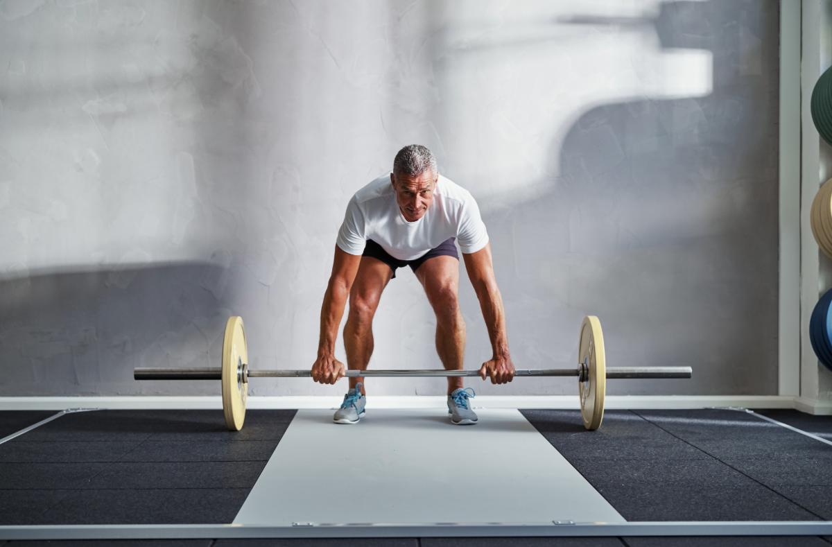 Man lifting a barbell